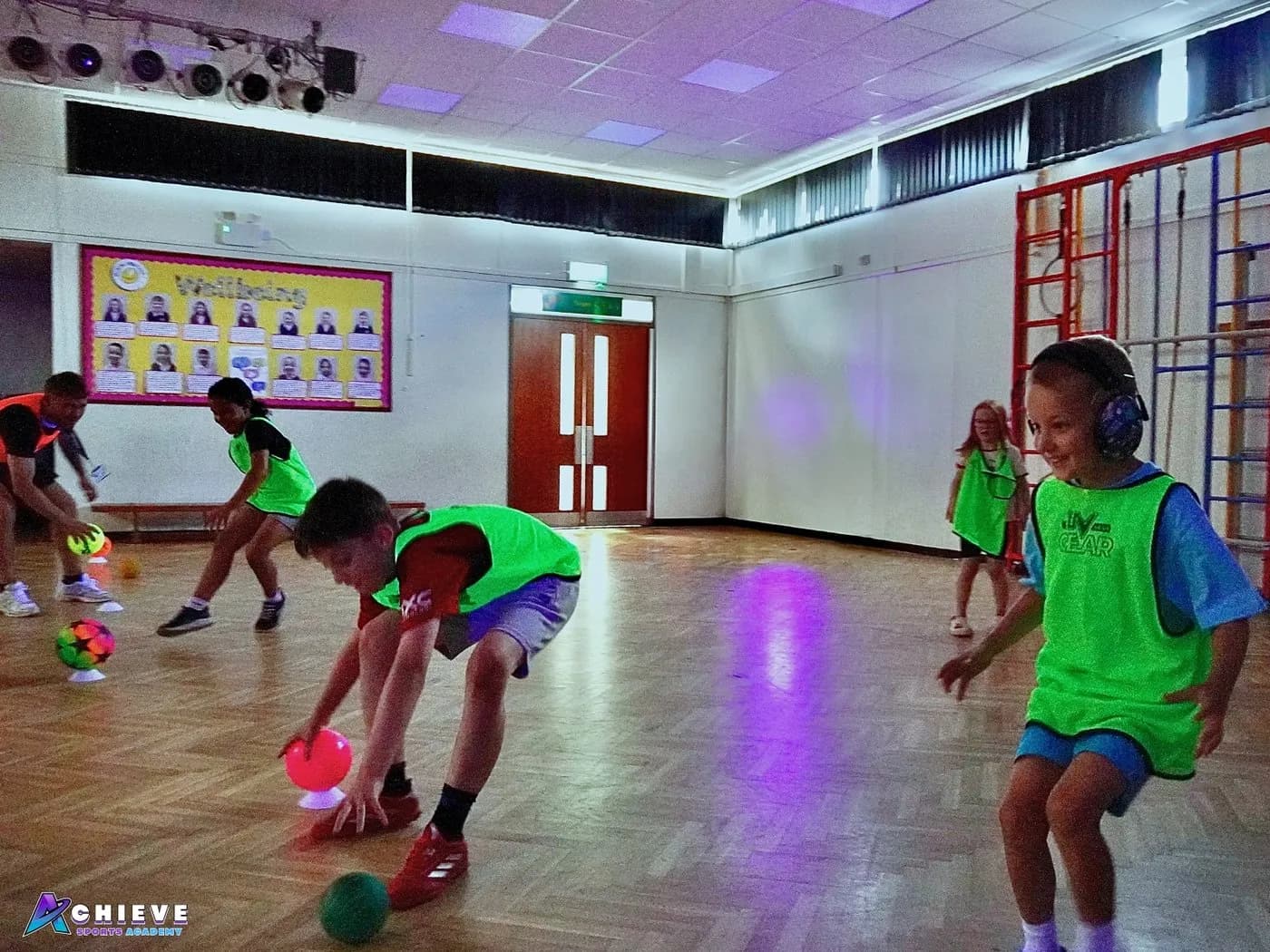 Children taking part in an Achieve Sports Academy school activity