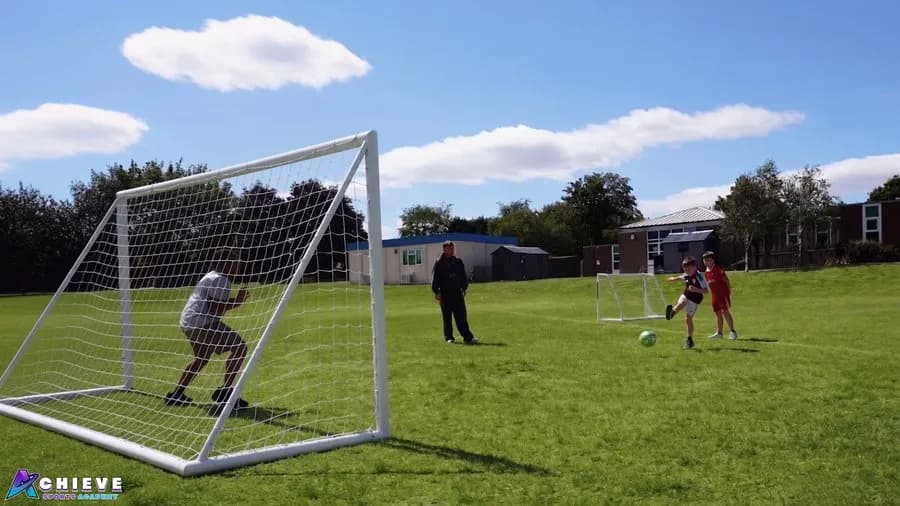 Children taking part in a school sport coaching session